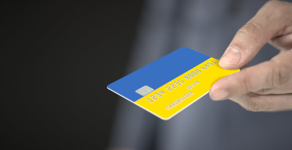 bank card with printed flag of ukraine